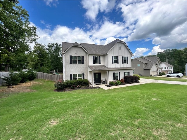 view of front of home with board and batten siding and driveway