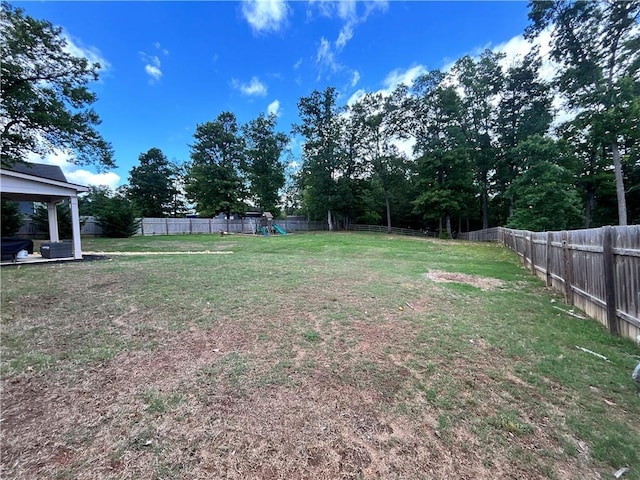 view of yard featuring a playground