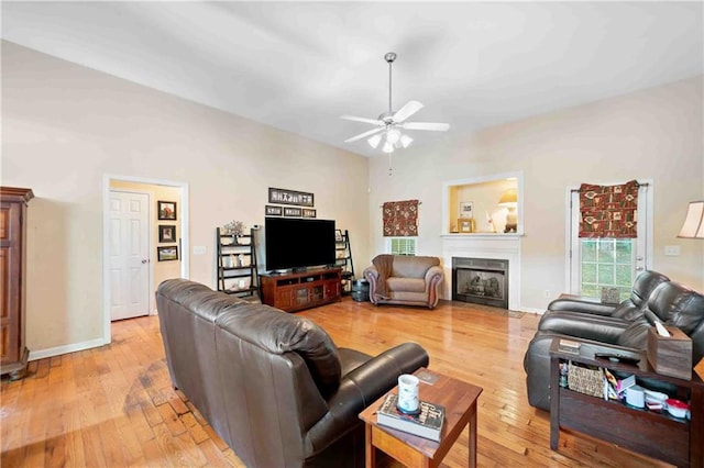 250 Brianna Blvd, Calhoun, GA 30701 - living area featuring ceiling fan, light wood-style floors, and a fireplace