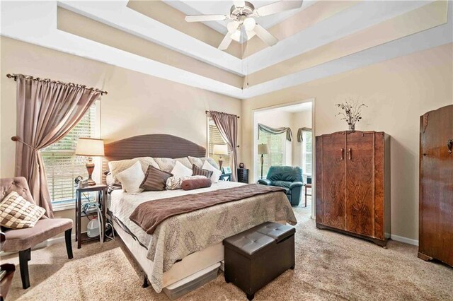 250 Brianna Blvd, Calhoun, GA 30701 - bedroom with light carpet, a tray ceiling, and ceiling fan
