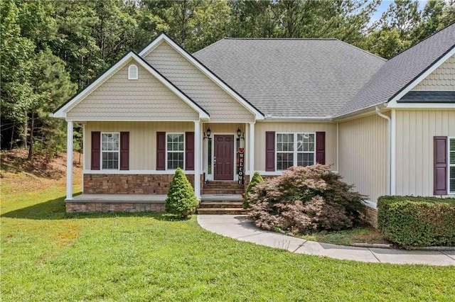 250 Brianna Blvd, Calhoun, GA 30701 - view of front facade with a front lawn, stone siding, and roof with shingles