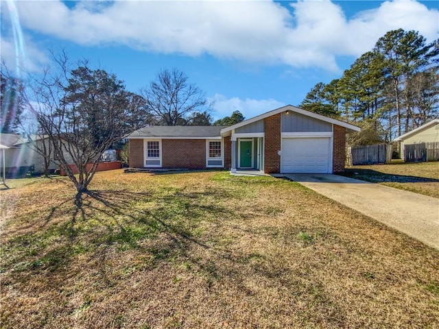 single story home with a garage and a front lawn