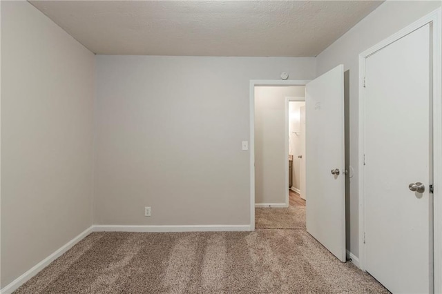 2045 Scarbrough Dr, Stone Mountain, GA 30088 - spare room with light carpet and baseboards
