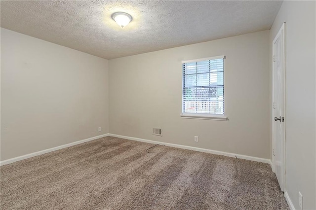 2045 Scarbrough Dr, Stone Mountain, GA 30088 - unfurnished room featuring carpet flooring, a textured ceiling, and baseboards