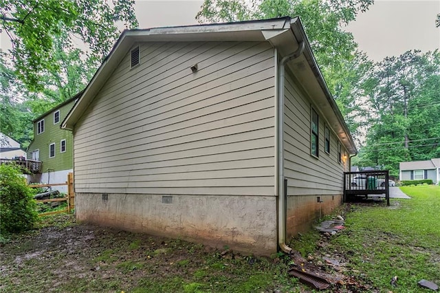 2045 Scarbrough Dr, Stone Mountain, GA 30088 - view of home's exterior with a wooden deck and crawl space