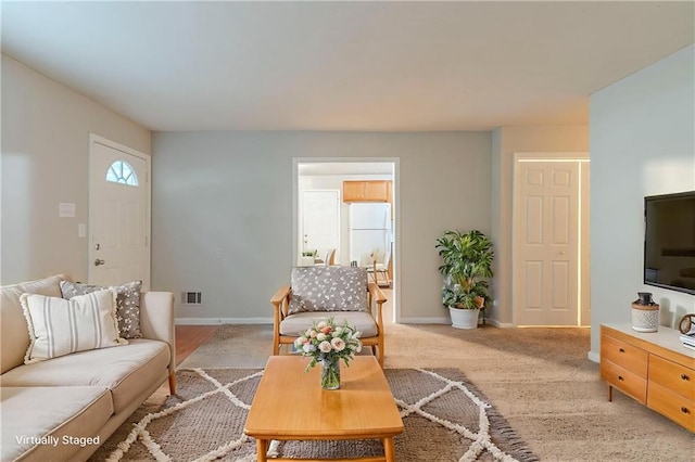 2045 Scarbrough Dr, Stone Mountain, GA 30088 - living area with baseboards and light carpet