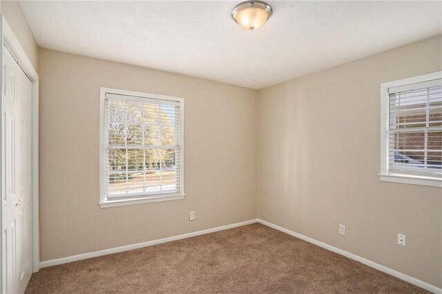 896 Meadow Rock Way, Stone Mountain, GA 30083 - spare room with carpet