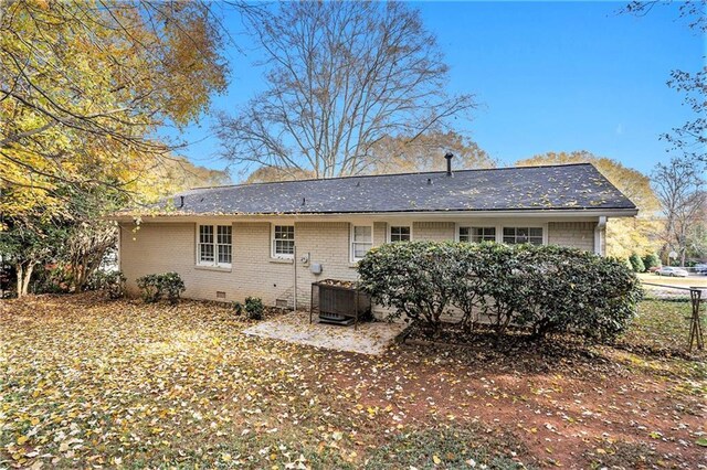 896 Meadow Rock Way, Stone Mountain, GA 30083 - rear view of house with central AC unit