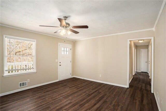 896 Meadow Rock Way, Stone Mountain, GA 30083 - unfurnished room with dark hardwood / wood-style floors, crown molding, and a textured ceiling