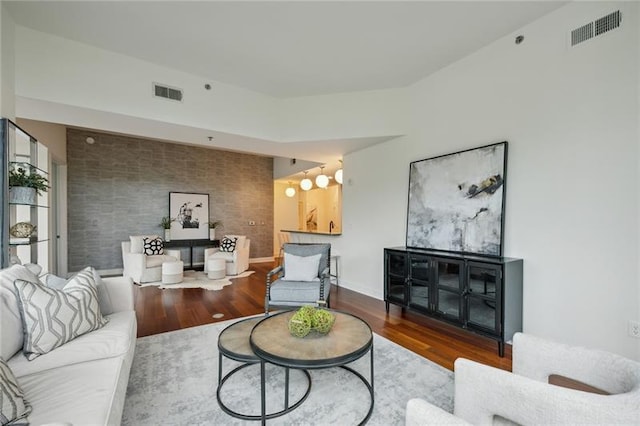 living room with dark wood-type flooring