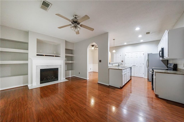 4844 W Park Cir Unit 4844, College Park, GA 30349 - kitchen with a ceiling fan, a sink, range, dark wood finished floors, and recessed lighting