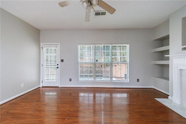 4844 W Park Cir Unit 4844, College Park, GA 30349 - unfurnished living room with ceiling fan, wood finished floors, and plenty of natural light