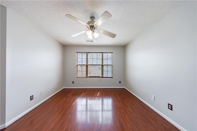 4844 W Park Cir Unit 4844, College Park, GA 30349 - empty room with a textured ceiling, wood finished floors, ceiling fan, and baseboards