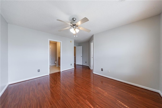 4844 W Park Cir Unit 4844, College Park, GA 30349 - empty room with a ceiling fan, wood finished floors, baseboards, and a textured ceiling