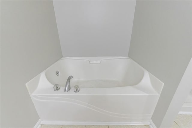 4844 W Park Cir Unit 4844, College Park, GA 30349 - bathroom featuring a garden tub and tile patterned flooring