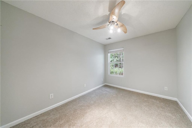 4844 W Park Cir Unit 4844, College Park, GA 30349 - spare room with carpet, a ceiling fan, baseboards, and a textured ceiling