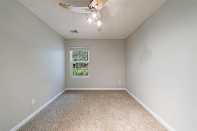 4844 W Park Cir Unit 4844, College Park, GA 30349 - spare room with a textured ceiling, a ceiling fan, light carpet, and baseboards