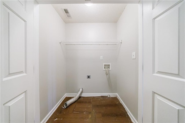 4844 W Park Cir Unit 4844, College Park, GA 30349 - clothes washing area with electric dryer hookup, hardwood / wood-style flooring, hookup for a washing machine, baseboards, and a textured ceiling