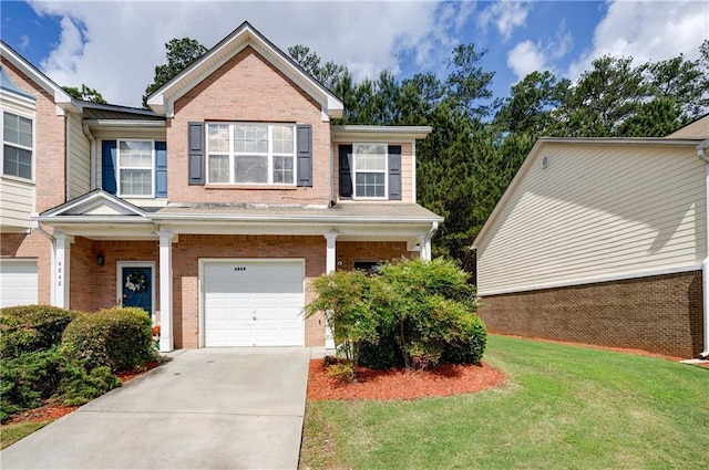 4844 W Park Cir Unit 4844, College Park, GA 30349 - view of front of home with brick siding, an attached garage, a front yard, and concrete driveway