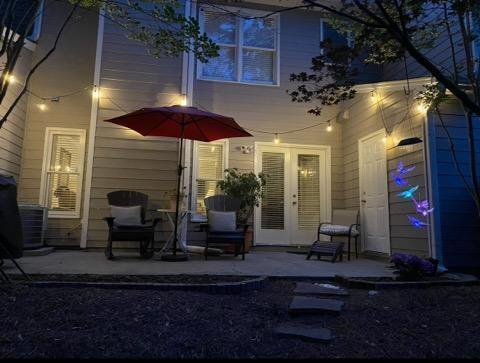 rear view of property featuring a patio