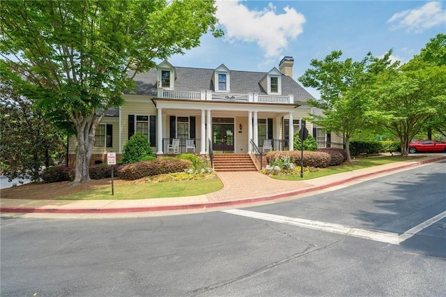 cape cod home with covered porch