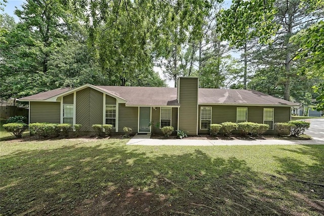 5807 Christopher Ln, Lithonia, GA 30058 - view of front of home with a chimney and a front lawn