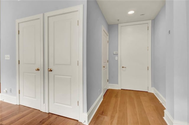 corridor featuring light wood-type flooring