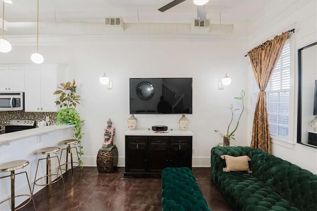 living room featuring ceiling fan