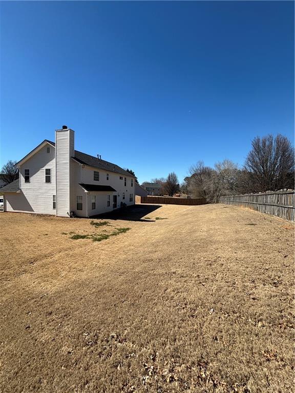 view of yard with fence