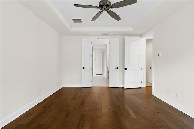 551 Pearl St, Cumming, GA 30040 - empty room with a raised ceiling, wood finished floors, and a ceiling fan