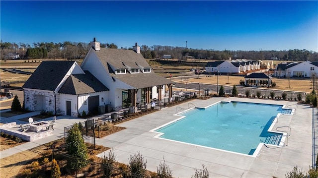 551 Pearl St, Cumming, GA 30040 - community pool with a gazebo and a patio area