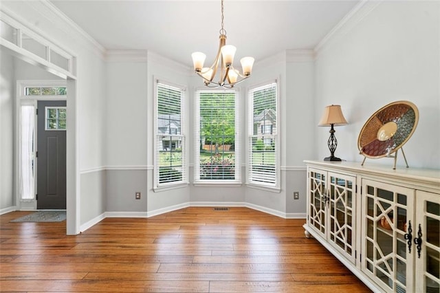 1126 Gate Post Ct, Powder Springs, GA 30127 - kitchen with a peninsula, open floor plan, a sink, appliances with stainless steel finishes, and a notable chandelier