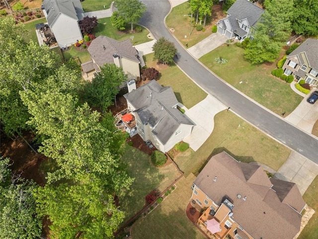 1126 Gate Post Ct, Powder Springs, GA 30127 - view of front of property with fence, an attached garage, a front yard, a chimney, and driveway
