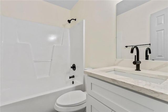 full bathroom featuring vanity, toilet, and bathtub / shower combination