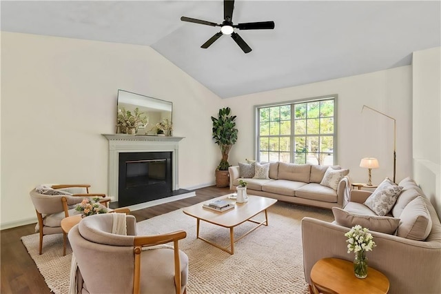 living room with vaulted ceiling, ceiling fan, and dark hardwood / wood-style floors