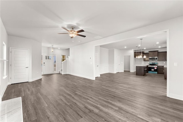 unfurnished living room featuring dark wood-style floors, recessed lighting, ceiling fan, and baseboards