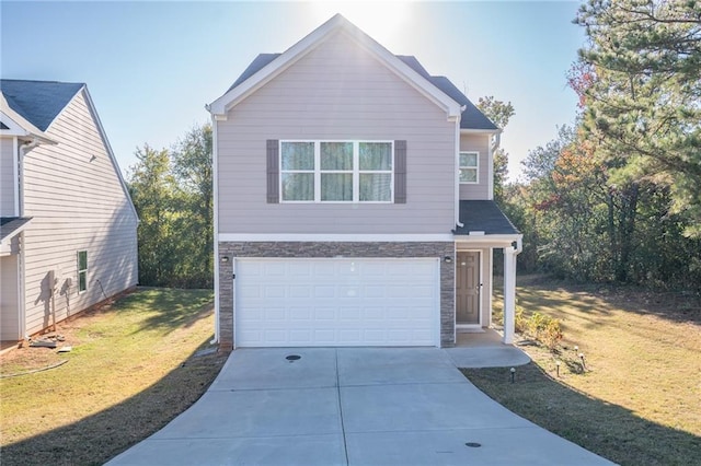 view of front facade with a garage and a front yard