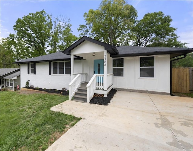 ranch-style house with a front lawn