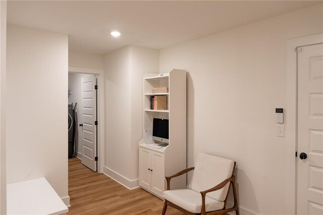 201 Advent Dr, Winder, GA 30680 - sitting room with light wood-style floors, baseboards, recessed lighting, and washer / dryer