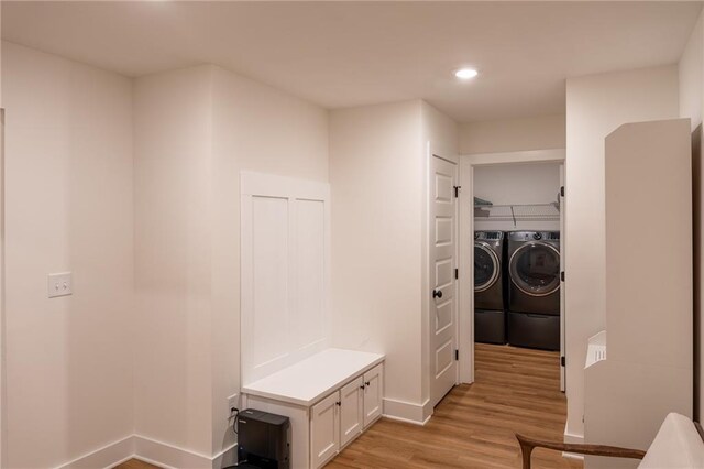 201 Advent Dr, Winder, GA 30680 - mudroom featuring washing machine and clothes dryer, light wood finished floors, baseboards, and recessed lighting