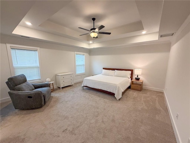 201 Advent Dr, Winder, GA 30680 - carpeted bedroom with a raised ceiling, baseboards, ceiling fan, and recessed lighting