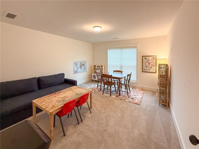 201 Advent Dr, Winder, GA 30680 - dining room featuring baseboards and light colored carpet