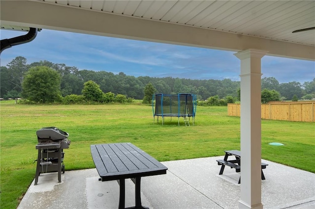 201 Advent Dr, Winder, GA 30680 - view of patio featuring a trampoline