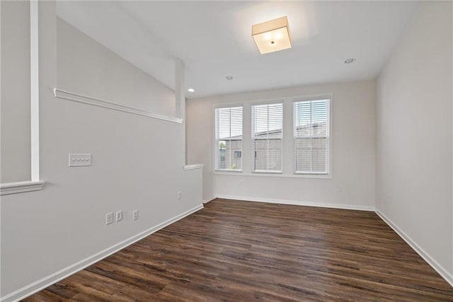 1227 Cushenberry Ln, Atlanta, GA 30318 - spare room featuring dark wood-style flooring, baseboards, and recessed lighting