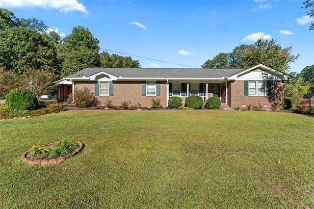 ranch-style house with a front lawn