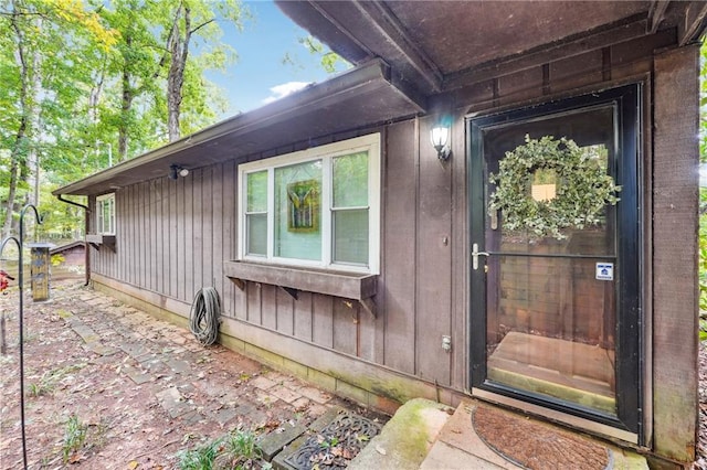 doorway to property featuring a patio