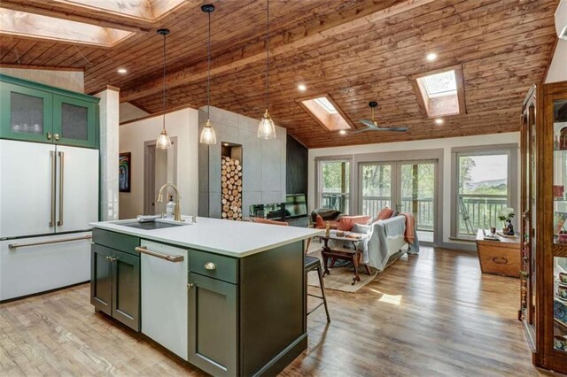 361 Rising Star Rd, Ellijay, GA 30536 - kitchen with a skylight, white appliances, green cabinets, wood ceiling, and a sink