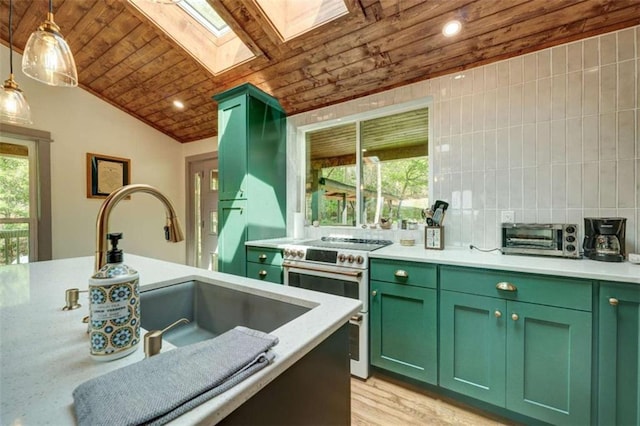 361 Rising Star Rd, Ellijay, GA 30536 - kitchen with green cabinetry, wood ceiling, double oven range, a skylight, and vaulted ceiling