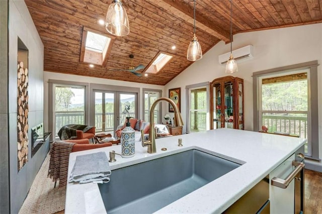 361 Rising Star Rd, Ellijay, GA 30536 - kitchen with wooden ceiling, a sink, healthy amount of natural light, decorative light fixtures, and light countertops