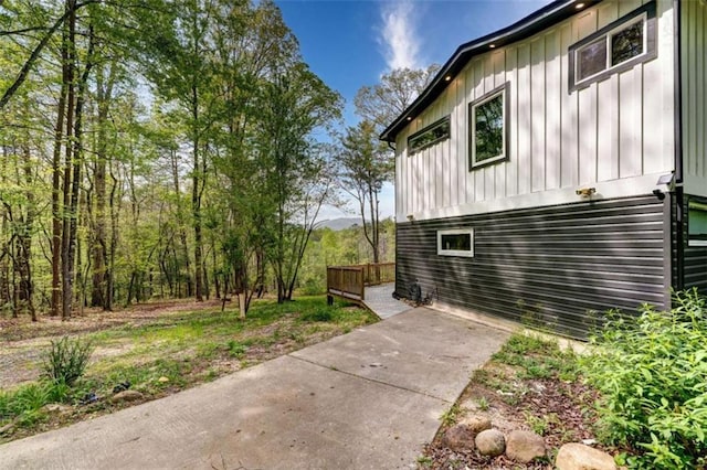 361 Rising Star Rd, Ellijay, GA 30536 - view of side of home featuring board and batten siding and a deck